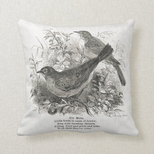 Des oiseaux Vintages ornent ce coussin de ferme