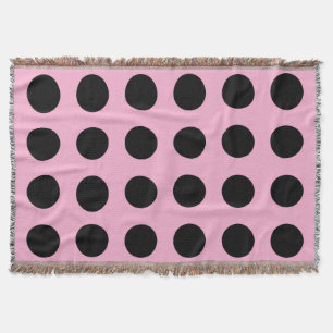 Des pois noirs et roses jettent la couverture