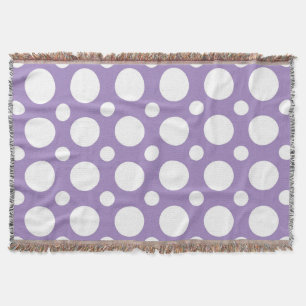 Des pois violets et blancs jettent la couverture