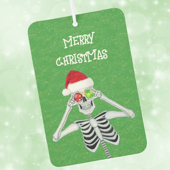 Désodorisant Pour Voiture Drôle Noël Squelette Ornement Eyeballs Vert (Funny Skeleton with shiny ornament eyeballs Santa hat on Christmas green car air freshener.)