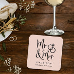 Dessous-de-verre Carré En Papier Mariage Faveur M. Mme Blush<br><div class="desc">Décorez vos tables de réception de mariage et donnez à vos invités mariages un souvenir souvenir amusant de votre journée spéciale avec ces dessous de verre roses roux personnalisés avec "Mr & Mrs" écrit dans un grand script et une illustration de deux anneaux mariages réunis. Ajoutez votre nom et votre...</div>