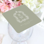 Dessous-de-verre Carré En Papier Noms vintages de crêtes de monogramme Sage Mariage<br><div class="desc">Ce design élégant présente une crête ornée, d'inspiration vintage, d'acanthus feuilles encadrant deux initiales monogrammes en police serif ouverte, empilée verticalement et séparée par une fine ligne horizontale. Ajoutez les noms du couple et la date du mariage ci-dessous. Le design et le texte sont en blanc sur un arrière -...</div>