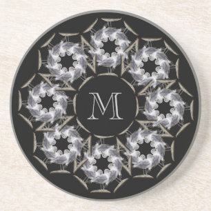 Dessous de verre décorés d'un monogramme de