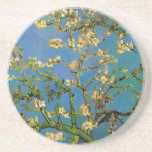 Dessous De Verre En Grès Arbre aux amandes en fleurs par Vincent van Gogh<br><div class="desc">Floraison d'amandiers (1890) par Van Gogh est un post impressionnisme vintage d'art floral encore vie peinture. Branche d'un amandier en fleurs dans un jardin de printemps avec le ciel bleu en arrière - plan. Belles fleurs blanches fleuries. À propos de l'artiste : Vincent Willem van Gogh (1853-1890) était un peintre...</div>