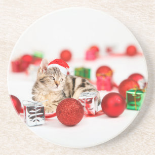 Dessous De Verre En Grès Chat portant un ornement de Noël au chapeau rouge
