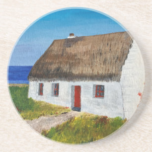 Dessous De Verre En Grès Cottage blanc surplombant la mer