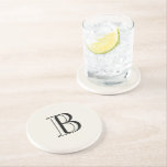 Dessous De Verre En Grès Crème simple et monogramme noir sur crème<br><div class="desc">Fond de pierre de sous-verre en crème et monogramme noir. Cadeau de monogramme.</div>