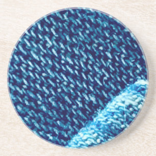 Dessous De Verre En Grès Gros plan sur la texture de tissu en denim bleu
