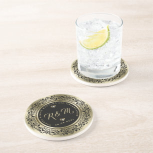 Dessous De Verre En Grès Tourbillons noirs encadrent un monogramme de maria