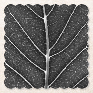 Dessous-de-verre En Papier Gros plan sur une feuille lumineuse en noir et bla