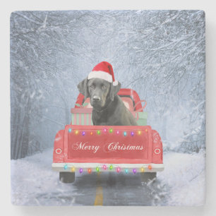 Dessous-de-verre En Pierre Chien noir du Labrador en neige assis à Noël
