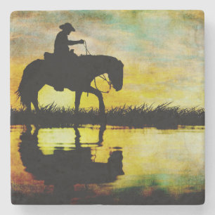 Dessous-de-verre En Pierre Cowboy à cheval au coucher du soleil.