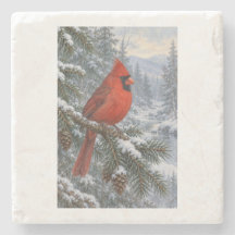 Épinette enneigée avec un cardinal rouge vif