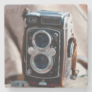 Dessous-de-verre En Pierre Gros plan d'un appareil photo antique