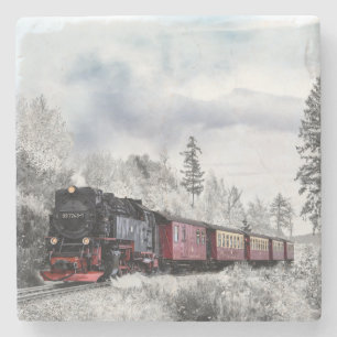Dessous-de-verre En Pierre Train à vapeur voyageant à travers la neige
