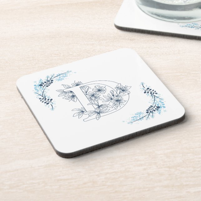 Dessous-de-verre Monogramme floral bleu "D" initial calmerie (Côté gauche)