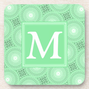 Dessous-de-verre Monogramme vert ressort cercles motif