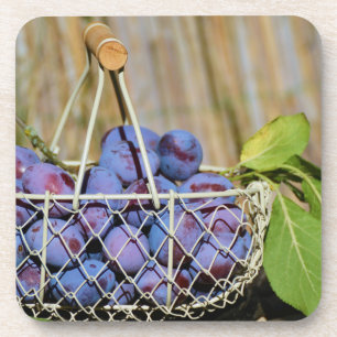 Dessous-de-verre Panier de prunes pourpres