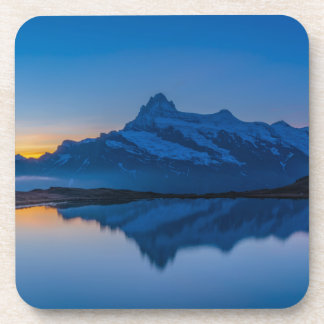 Dessous-de-verre Reflet de l'eau au coucher du soleil sur la montag