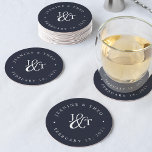 Dessous-de-verre Rond En Papier Monogramme Mariage bleu et blanc de la marine<br><div class="desc">Des dessous de verre bleu marine robustes pour votre heure de cocktail mariage ou la réception présentent vos initiales travaillées dans un monogramme, joint par un ornement décoratif. Vos noms et votre date de mariage apparaissent en lettres blanches, courbées autour de l'extérieur. Conçu pour coordonner avec notre collection de faire-part...</div>