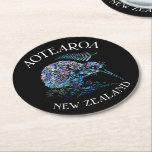 DESSOUS-DE-VERRE ROND EN PAPIER NOUVELLE-ZÉLANDE KIWI PAUA<br><div class="desc">Kiwi néo-zélandais classique,  aux couleurs vives de la coquille de Paua.</div>
