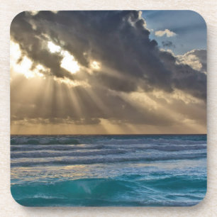 Dessous-de-verre Soleil perçant les nuages au-dessus de la mer