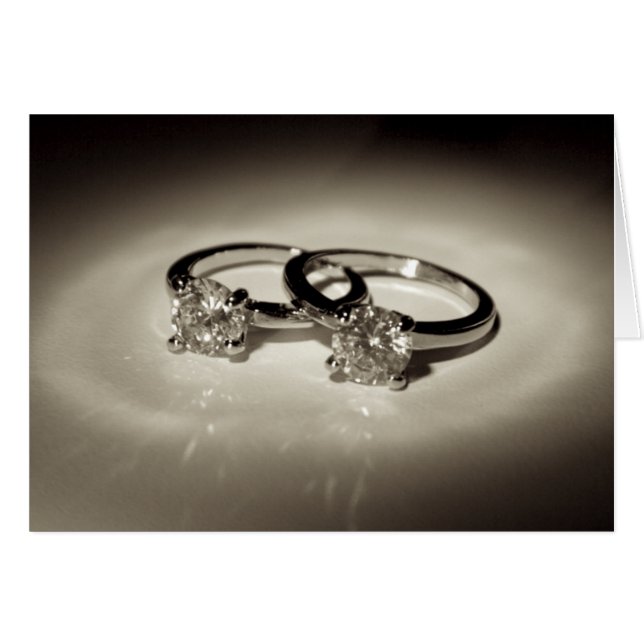 Deux anneaux de solitaire (Devant horizontal)