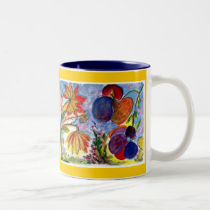 Deux grandes tasses bleues et oranges de fleur