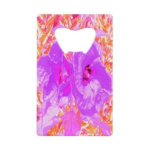 Deux Hibiscus de prune violet et rose chaud sur ro