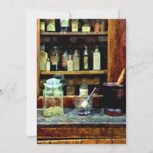 Deux mortiers et pilons et jarre de verre