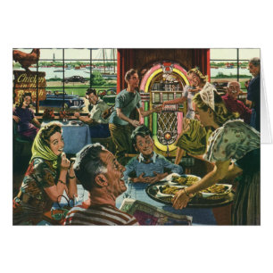 Dîner vintage en famille à un dîner avec Jukebox