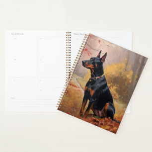 Doberman dans les feuilles d'automne tombent inspi