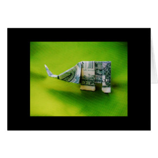 Dollar facture origami éléphant sur arrière - plan