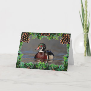 Duck de bois tiré sur une carte de Noël