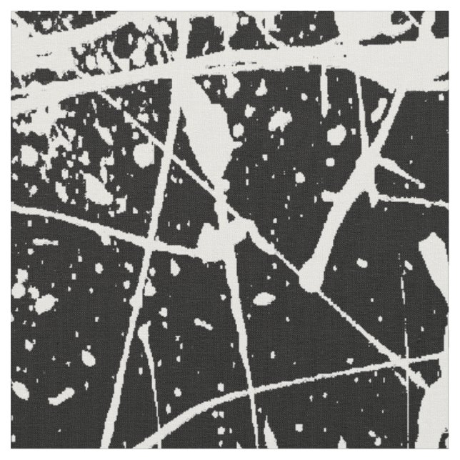 Éclaboussure blanche sur le tissu noir (Fermer)