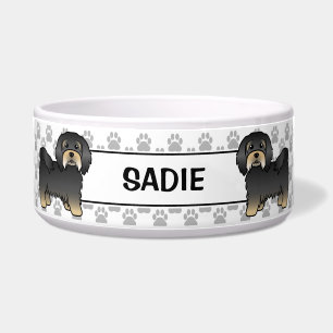 Écuelle Havanais noir et feu Chien mignon avec des pattes