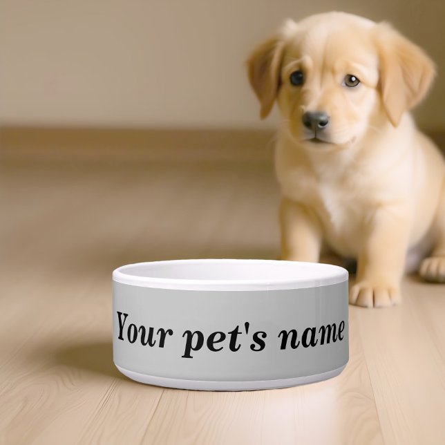 Écuelle Le nom de votre chien avec un fond gris sur la gam (Pet bowl with your pet's name on gray background)