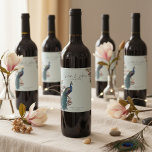 Elégant bleu Floral Peacock Mariage Étiquettes de<br><div class="desc">Ces Elégants Étiquettes de vin Mariage Peacock Floral Bleu présentent un paon dessiné à la main en bleu et turquoise perché sur des branches de magnolia en pleine floraison, illustré à l'encre noire, contre un arrière - plan bleu clair élégant. Conçus pour les mariage, ces étiquettes de vin personnalisés peuvent...</div>