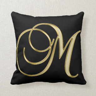 ÉLÉGANT COUSSIN NOIR AVEC DÉTAILS EN OR