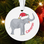 Eléphant blanc mignon à Santa Hat Noël personnalis<br><div class="desc">Les mignons animaux de vacances sont ma partie préférée de Noël. Un bel éléphant blanc portant un chapeau de Père Noël rouge et qui a l'air heureux. Ce joli ornement personnalisé me remplit d'esprit de Noël.</div>