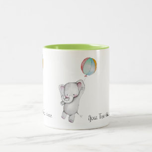 Éléphant de bébé avec la tasse de ballon