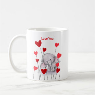 Éléphant mignon avec la tasse rouge de coeurs