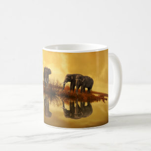 Éléphants à la tasse de café de réflexion de lac