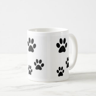Empreintes de pas de belle tasse de chatons