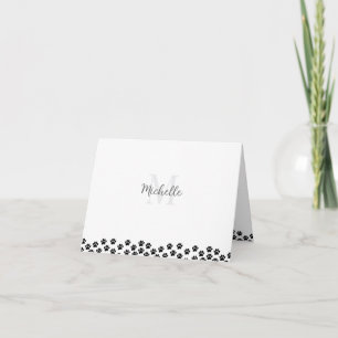 Empreintes de patte de compagnie noire Monogramme