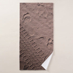 Empreintes pieds dans le sable