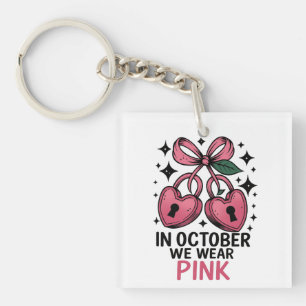 En octobre nous portons un porte-clés rose pour la