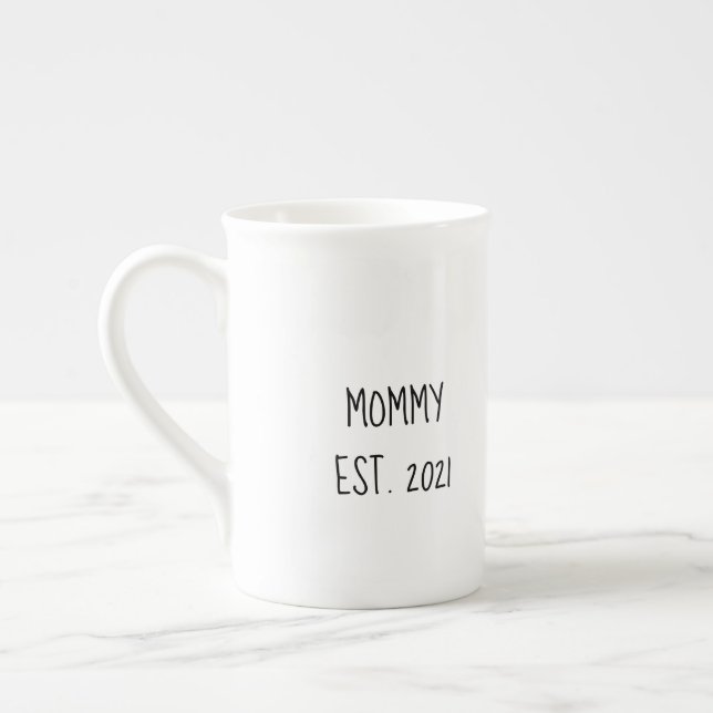 En Porcelaine Maman 'est year' tasse pour les nouveaux parents (Gauche)