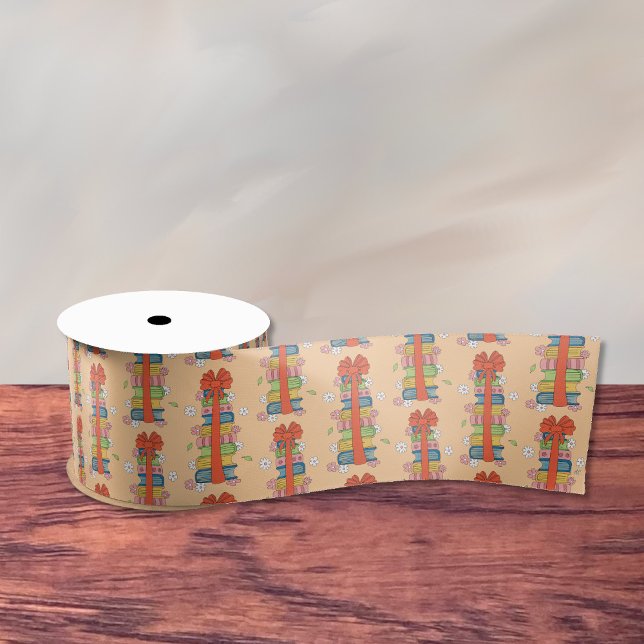 En Satin Pile de livre avec ruban rouge Bow (Book stacks with red bow pattern ribbon .)