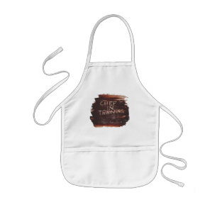Enfant chef dans le tablier de formation